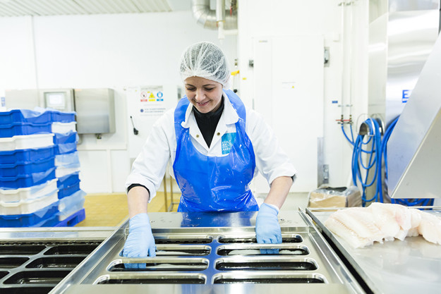 Arbeider på fabrikken